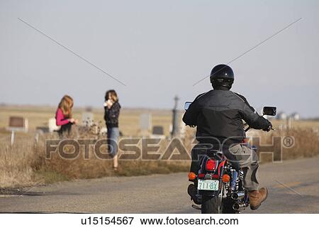 drving down road bicycle biker bikers black View Large Photo Image Stock Photo - drving down road bicycle biker bikers black. Fotosearch
