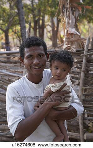 Stock Photo -  face timor leste father son kutepe east asia . Fotosearch