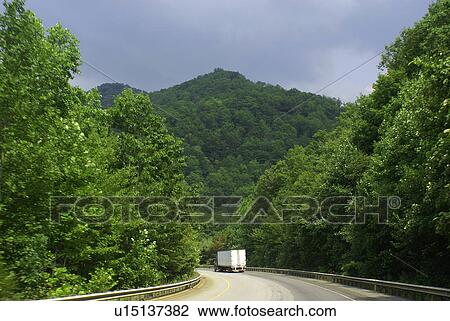 Stock Image -  family car road roadway pavement drive travel . Fotosearch