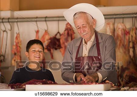 family child children kid butcher el tuito meat View Large Photo Image Stock Photo - family child children kid butcher el tuito meat . Fotosearch