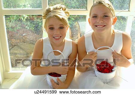 Stock Photo -  flower children 10-12 years 7-9 angelic angels. Fotosearch