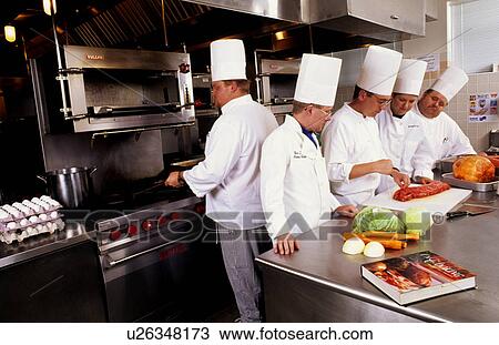 Stock Image -  food school chefs learning in cook andf prepare. Fotosearch