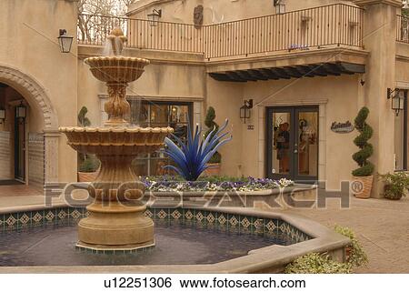 Stock Photograph -  fountain courtyard within arts crafts village az. Fotosearch