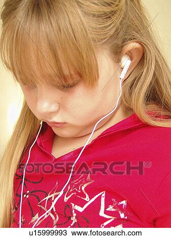 girl earphones buds earphone earpiece preteen View Large Photo Image Stock Image - girl earphones buds earphone earpiece preteen . Fotosearch
