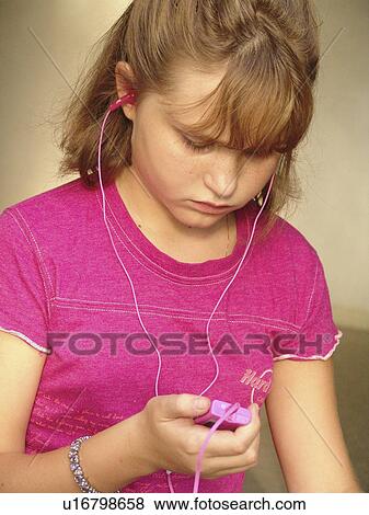 girl earphones buds earphone earpiece preteen View Large Photo Image Stock Photo - girl earphones buds earphone earpiece preteen . Fotosearch