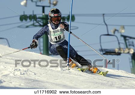 Stock Image -  girl winter teenage gate in slalom ski race girl . Fotosearch
