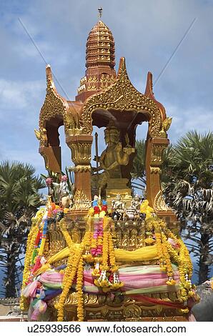 Stock Photograph -  golden buddha statue in phuket offerings gold. Fotosearch