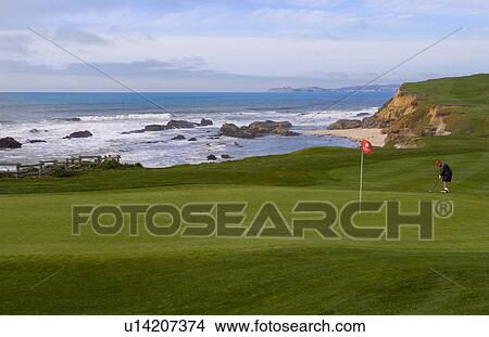 Picture -  golf beauty men friends golfing 18th green . Fotosearch