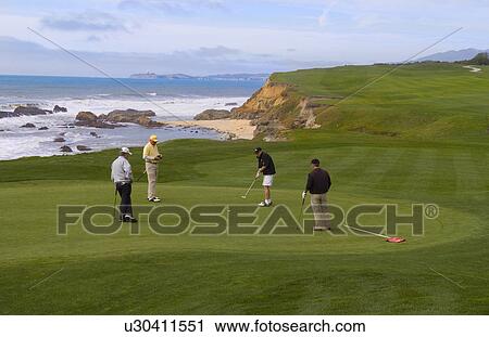 Stock Image -  golf beauty men friends golfing 18th green old. Fotosearch