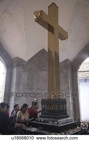 Stock Image -  hand india golden cross said mark spot where thomas inscribed rock. Fotosearch