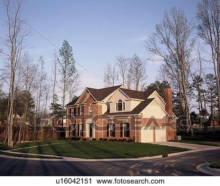Stock Image -  house home bare trees building . Fotosearch