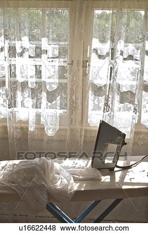 house sun ironing vertical portrait color colour View Large Photo Image Stock Photo - house sun ironing vertical portrait color colour . Fotosearch