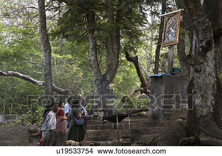 Picture -  india faithfiul station cross pilgrimage hill. Fotosearch