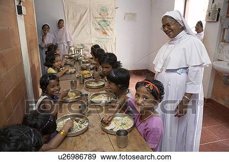 india mealtime mary matha bala bhavan girls run View Large Photo Image Stock Photo - india mealtime mary matha bala bhavan girls run. Fotosearch