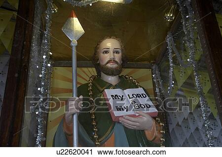 Stock Image -  india statue thomas in small latin chapel river. Fotosearch