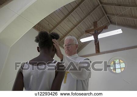 jamaica american priest sunday mass catholic View Large Photo Image Stock Photograph - jamaica american priest sunday mass catholic . Fotosearch