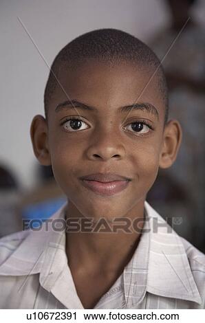 Stock Image -  jamaica boy sunday mass catholic church . Fotosearch
