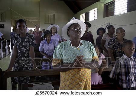 Picture -  jamaica sunday mass in catholic church seaford. Fotosearch