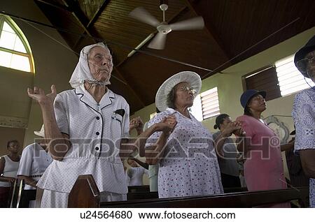 jamaica sunday mass in catholic church seaford View Large Photo Image Stock Image - jamaica sunday mass in catholic church seaford. Fotosearch