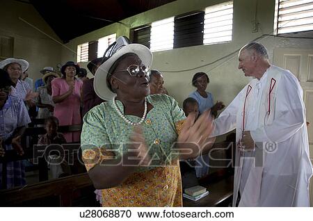 jamaica sunday mass in catholic church seaford View Large Photo Image Stock Image - jamaica sunday mass in catholic church seaford. Fotosearch