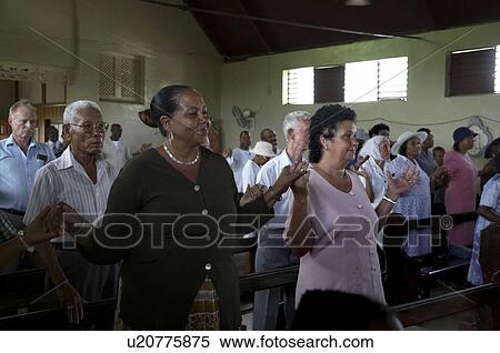 Stock Photography -  jamaica sunday mass in catholic church seaford. Fotosearch