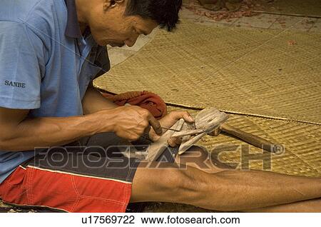 man art woodworker carving statuette in bali View Large Photo Image Stock Image - man art woodworker carving statuette in bali. Fotosearch