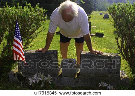 Stock Photography -  man male grieve grave visit grief death american. Fotosearch