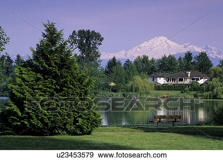 Stock Photo - man mill lake mount baker in washington. Fotosearch