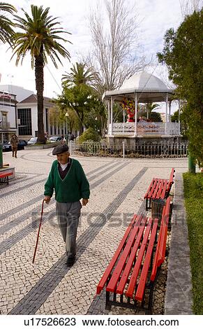 man old walking in small village tavira algarve View Large Photo Image Stock Image - man old walking in small village tavira algarve . Fotosearch