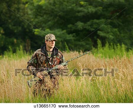 man person 25-30 years 30-35 alert camouflage View Large Photo Image Stock Image - man person 25-30 years 30-35 alert camouflage. Fotosearch