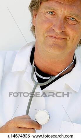 Stock Photography -  medical man person doctor 40-45 years blonde doc. Fotosearch