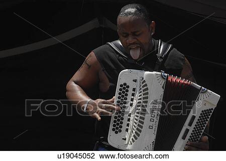 music art zydeco musician rocks out accordion View Large Photo Image Stock Image - music art zydeco musician rocks out accordion. Fotosearch