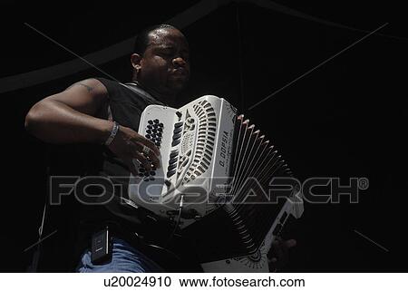 music art zydeco musician rocks out accordion View Large Photo Image Stock Image - music art zydeco musician rocks out accordion. Fotosearch