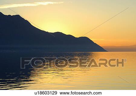 Stock Photo -  nature sunset lake geneva attractive autumn calm . Fotosearch