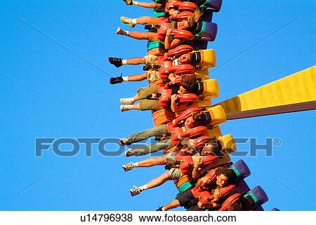 Stock Photo -  people adults amusement park caucasian . Fotosearch