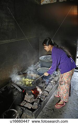 Stock Photo -  people border person fire myanmar used cooking. Fotosearch