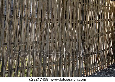 Stock Photo -  people border person myanmar detail bamboo fence. Fotosearch