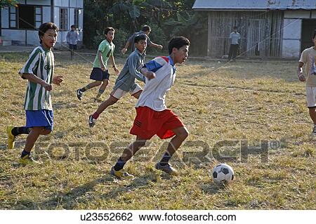 Stock Image -  people child border football person children. Fotosearch