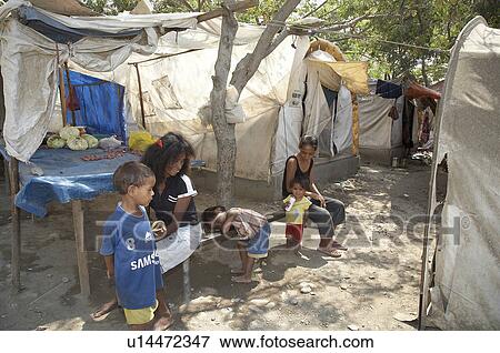 Stock Photo -  people child children timor leste camp for idps. Fotosearch