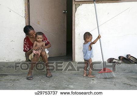 Stock Photo -  people child children timor leste camp for idps. Fotosearch