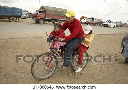Stock Photography -  people child man person children bolivia bicycle . Fotosearch