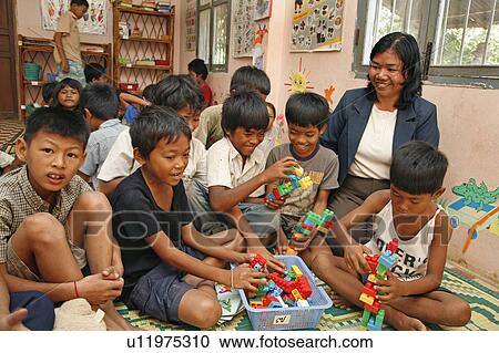 Stock Image -  people child person children cambodia care phnom. Fotosearch