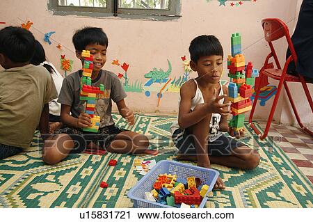 Stock Image -  people child person children cambodia care phnom . Fotosearch