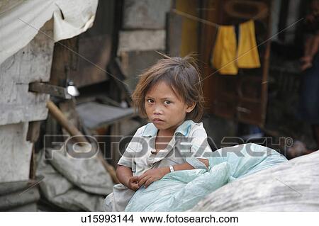 Picture -  people child person children living shantytown . Fotosearch