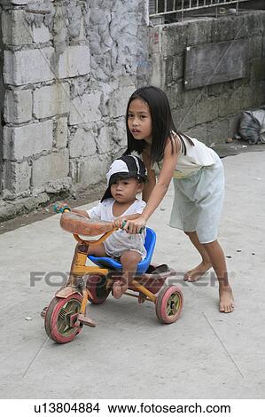people child person children playing street slum View Large Photo Image Picture - people child person children playing street slum . Fotosearch