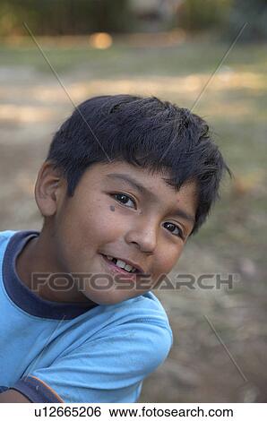 Stock Photograph -  people child person face children chile mapuche . Fotosearch