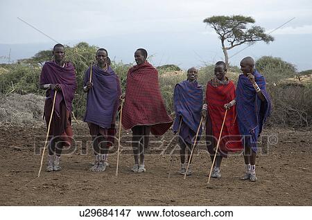 Stock Photo -  people dance person kenya masai men getting park. Fotosearch