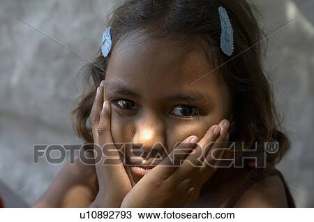 Stock Image -  people girl child children timor leste camp for. Fotosearch
