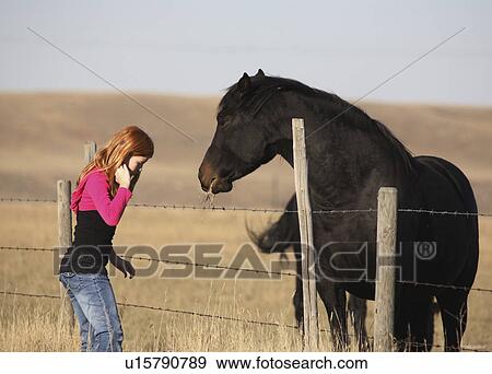 Stock Photo -  people girl horse children young in scenic fall. Fotosearch