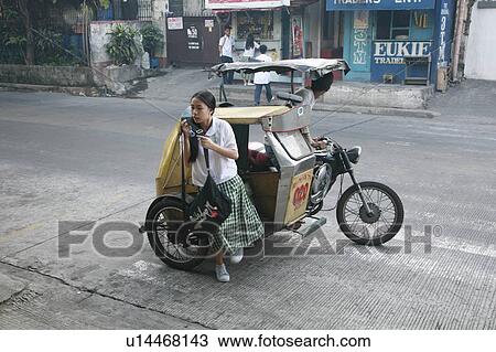 Stock Image -  people girl person school getting off motorcycle . Fotosearch